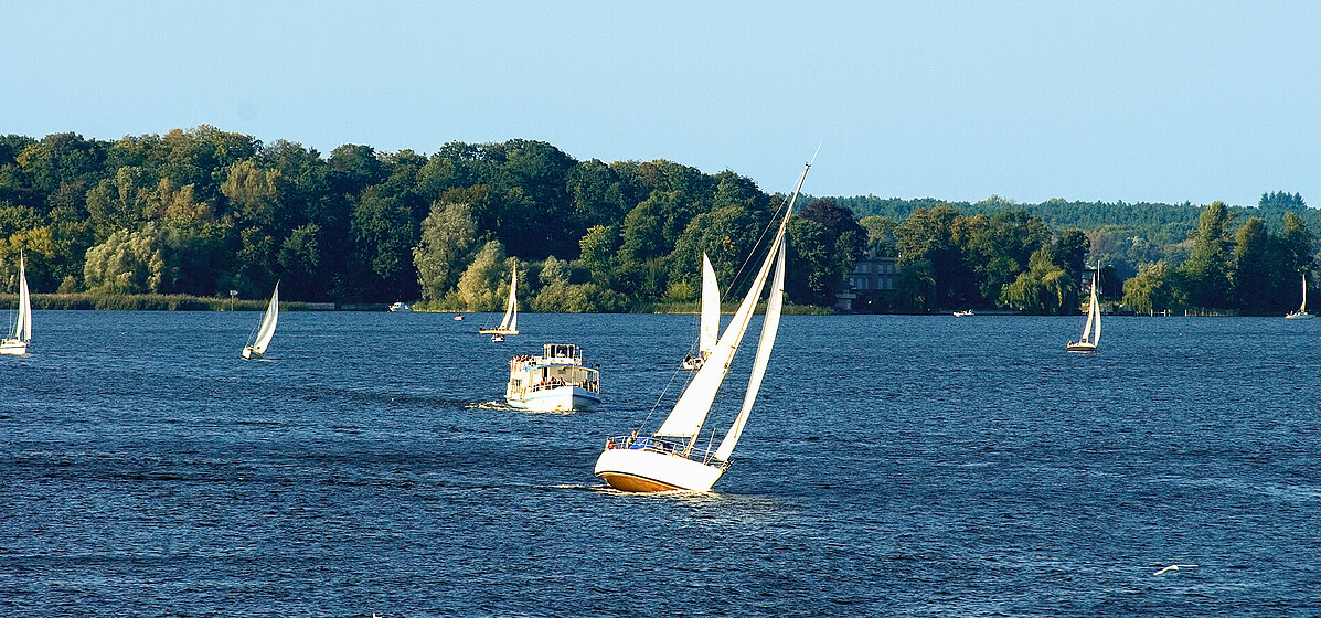 Sailing on the Wannsee. Pleasure boats and sailboats on the Wannsee, in the Berlin borough of Steglitz-Zehlendorf.